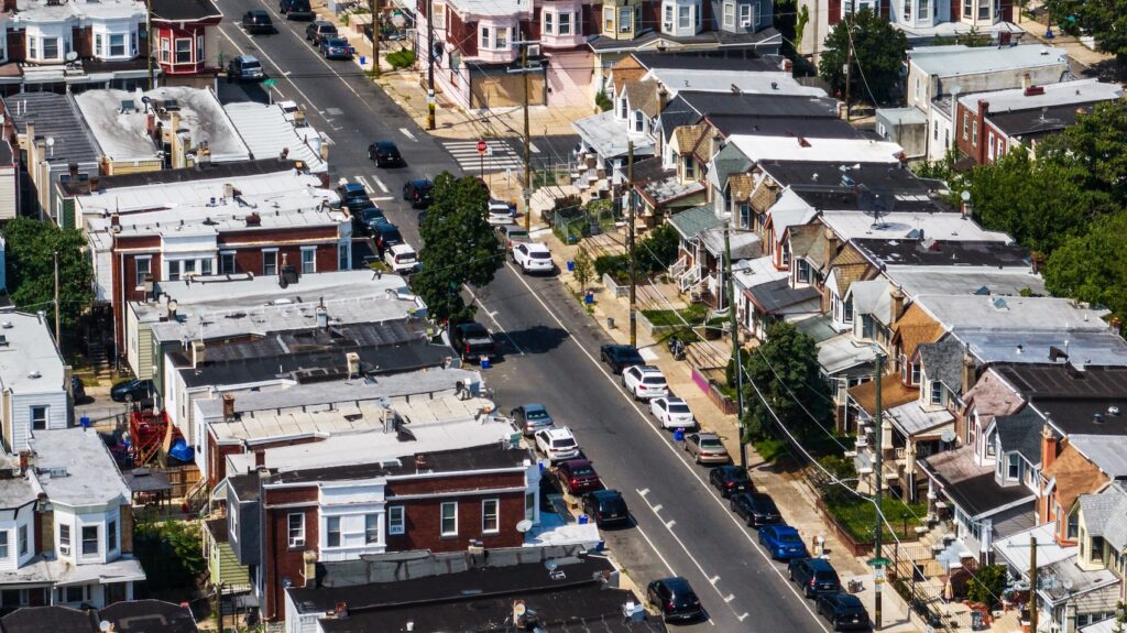 West Philadelphia row homes. (Kimberly Paynter/WHYY) An aerial view of residential streets in West Philadelphia