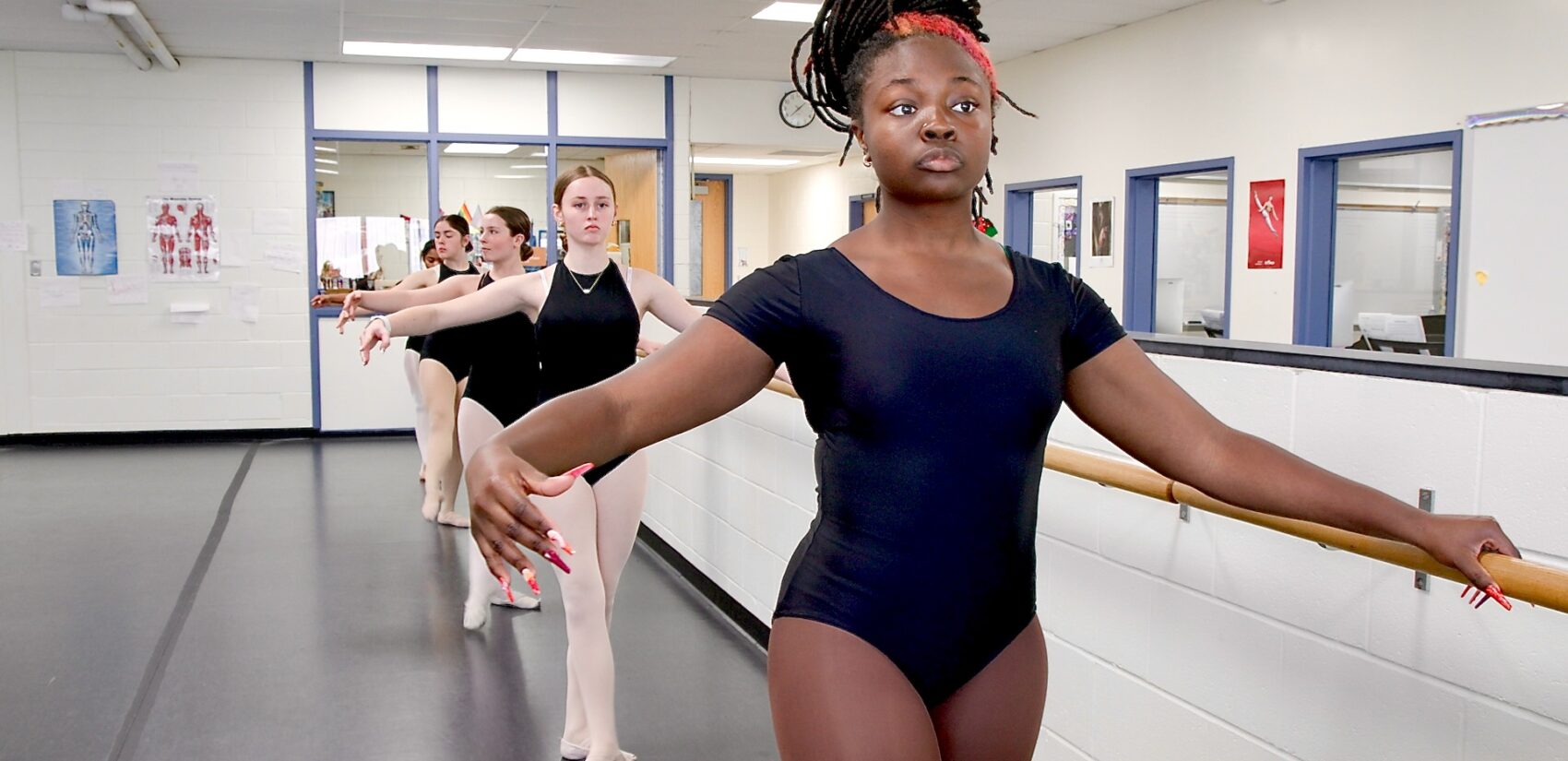 A row of students during a dance class