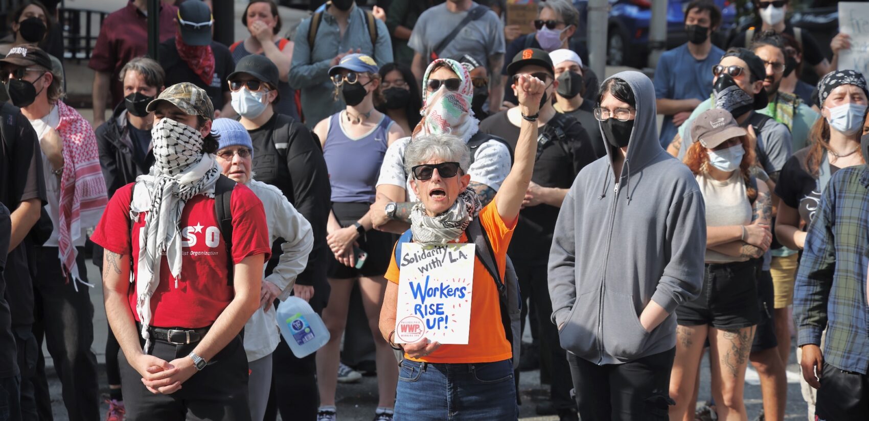 Protesters gather outside the Federal Detention Center at 7th and Arch streets. About 200 participated in the protest, spurred by ICE arrests.