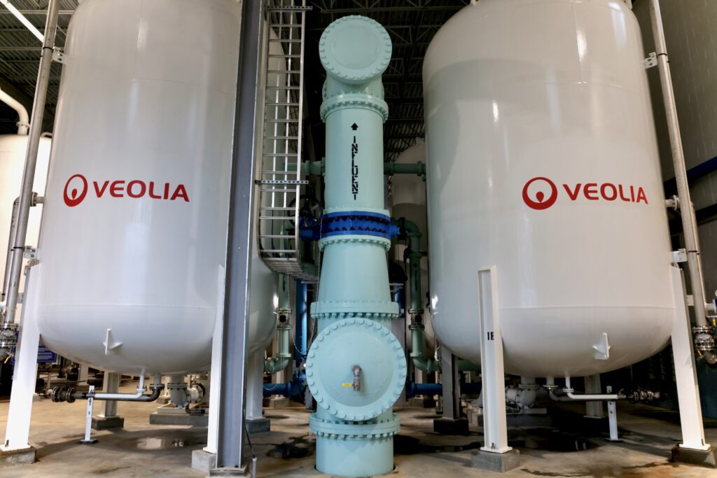 Tanks used to treat water for PFAS stand at Veolia's Stanton treatment plant