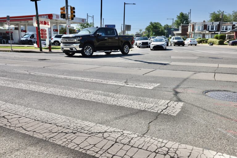 a faded crosswalk at the intersection of Baltimore Avenue, Cobbs Creek Parkway and 58th Street
