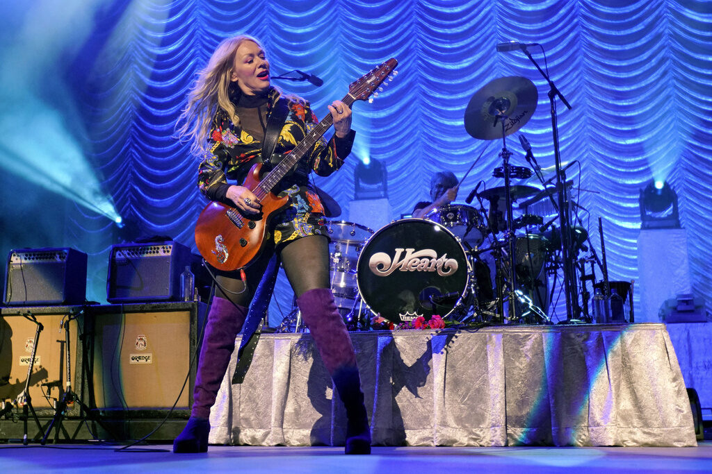 Heart-Stolen Instruments The band Heart performs live on stage, with Nancy Heart playing an electric guitar