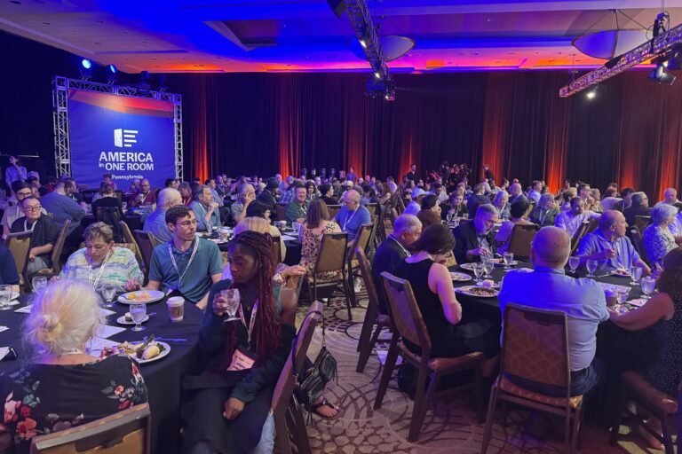 Nearly 200 voters sitting at the America in One Room event