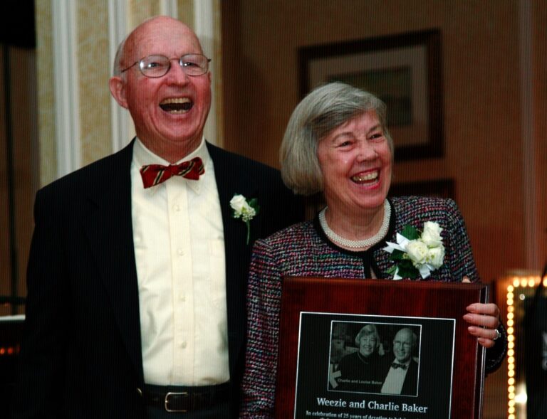 Charlie and Weezie accepting an awards