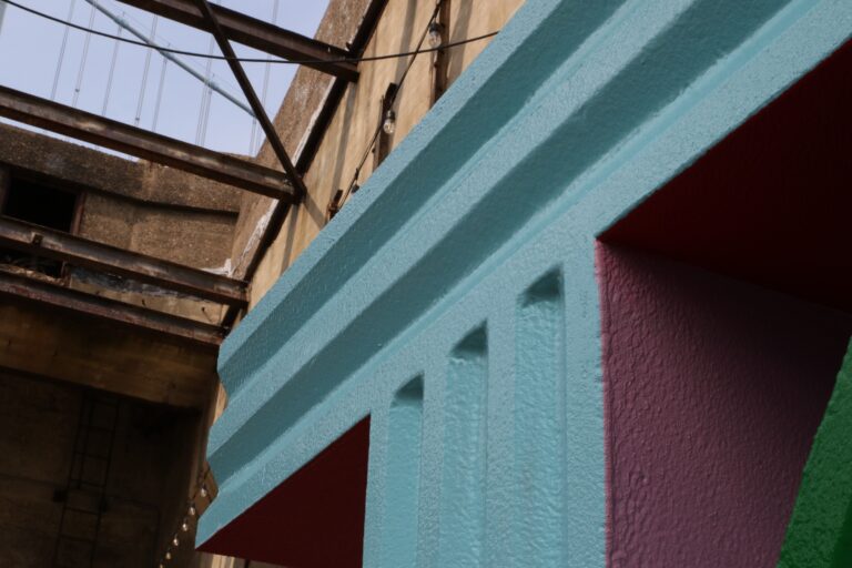 close-up on the T of the In Plain Sight sculpture at Cherry Street Pier