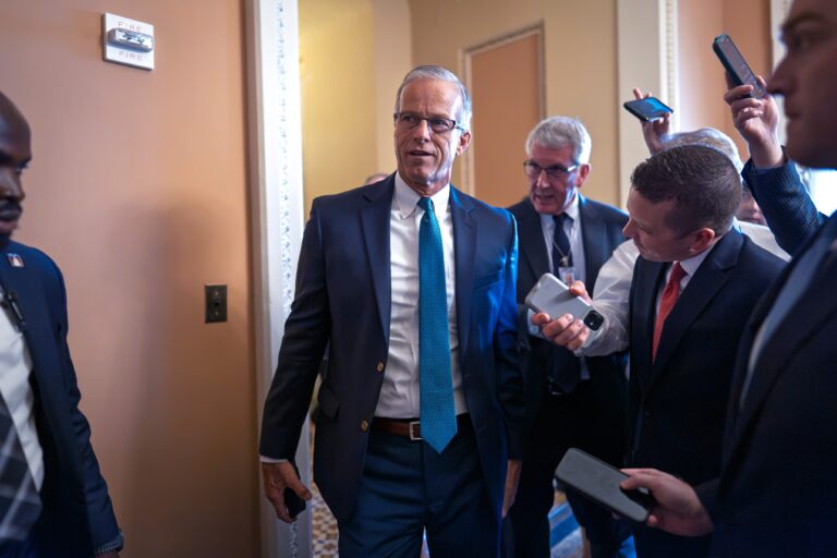 John Thune arrives to a meeting