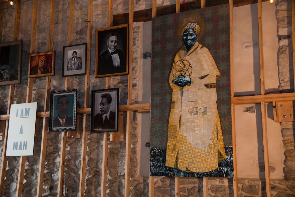 Voices Underground Memorial Walk Courtesy of Voices Underground images and artifacts on display on the wall