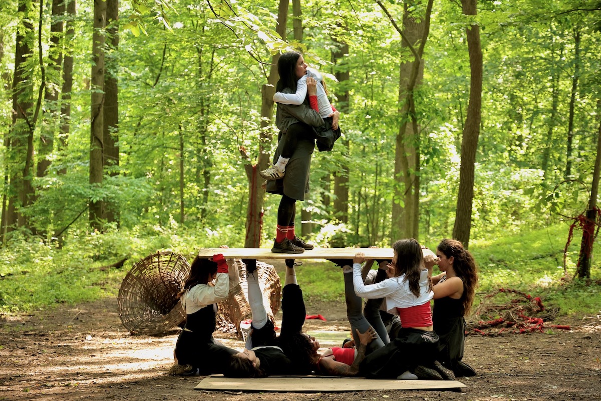 Dancers perform in the woods of the Schuylkill Center