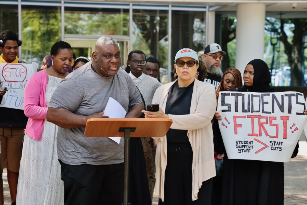 Mike Warren speaking at protest in Trenton