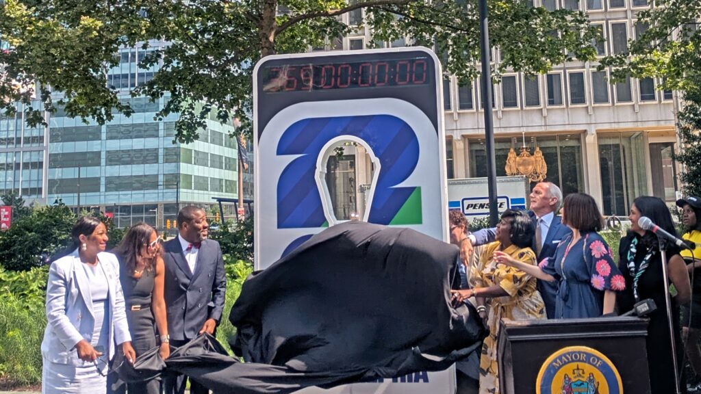 Officials unveil the new countdown clock