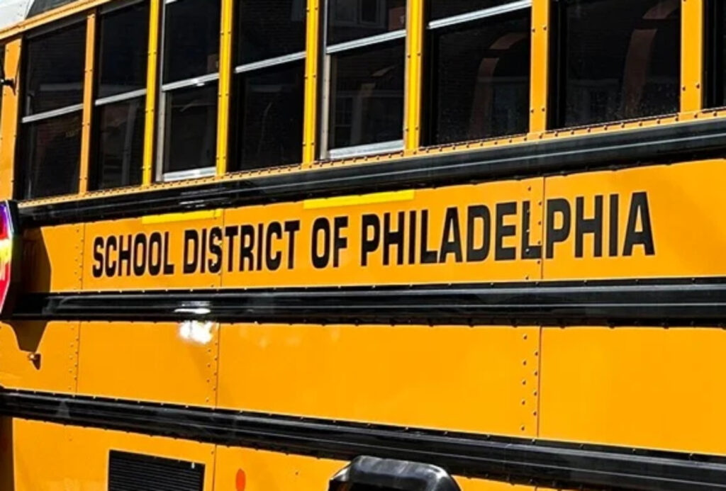File: An electric school bus parked at Lamberton Elementary in West Philadelphia