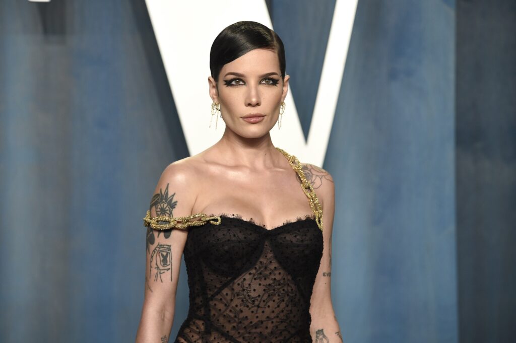 Halsey posing on the red carpet