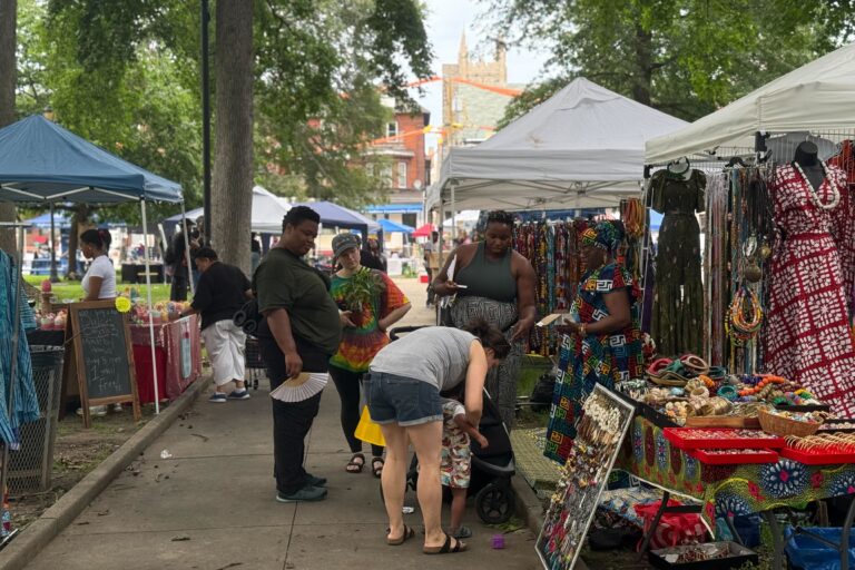 Community members gather around Malcolm X Park