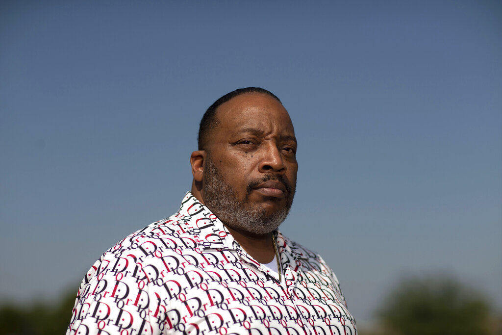 Gospel singer and pastor Marvin Sapp poses for a photo in front of a blue sky