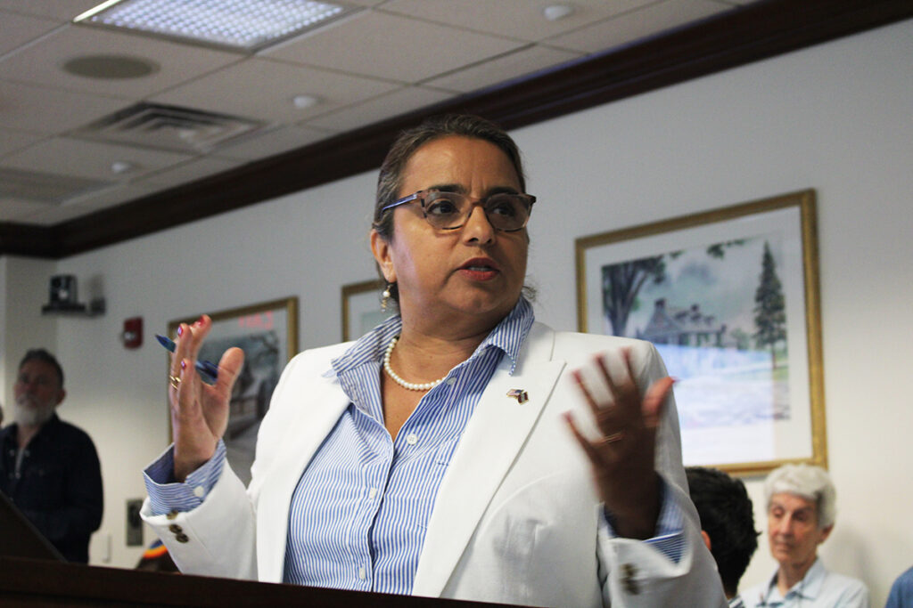 nelly-jimenez-arevalo Nelly Jiménez-Arévalo, Montgomery County's first ever director of immigrant affairs, stands at a podium to speak