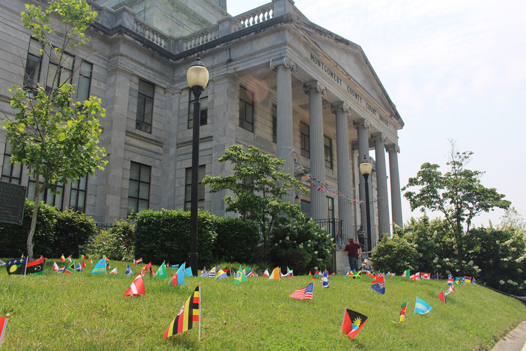 Flags from different nations are planted outside of a government building in Montgomery County, Pennsylvania