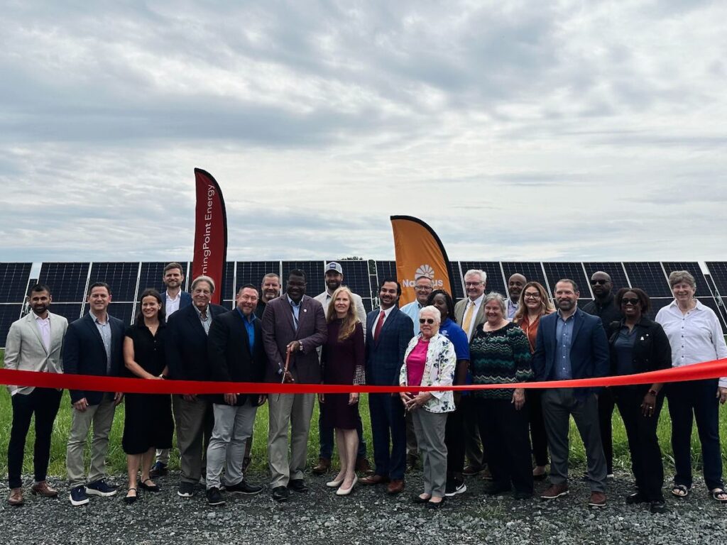 state officials joined leaders from Nautilus Solar Energy at ribbon cutting event for new solar panels