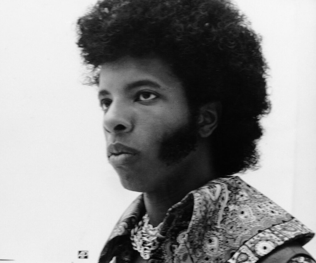 Sly Stone A closeup photo of a young Sly Stone