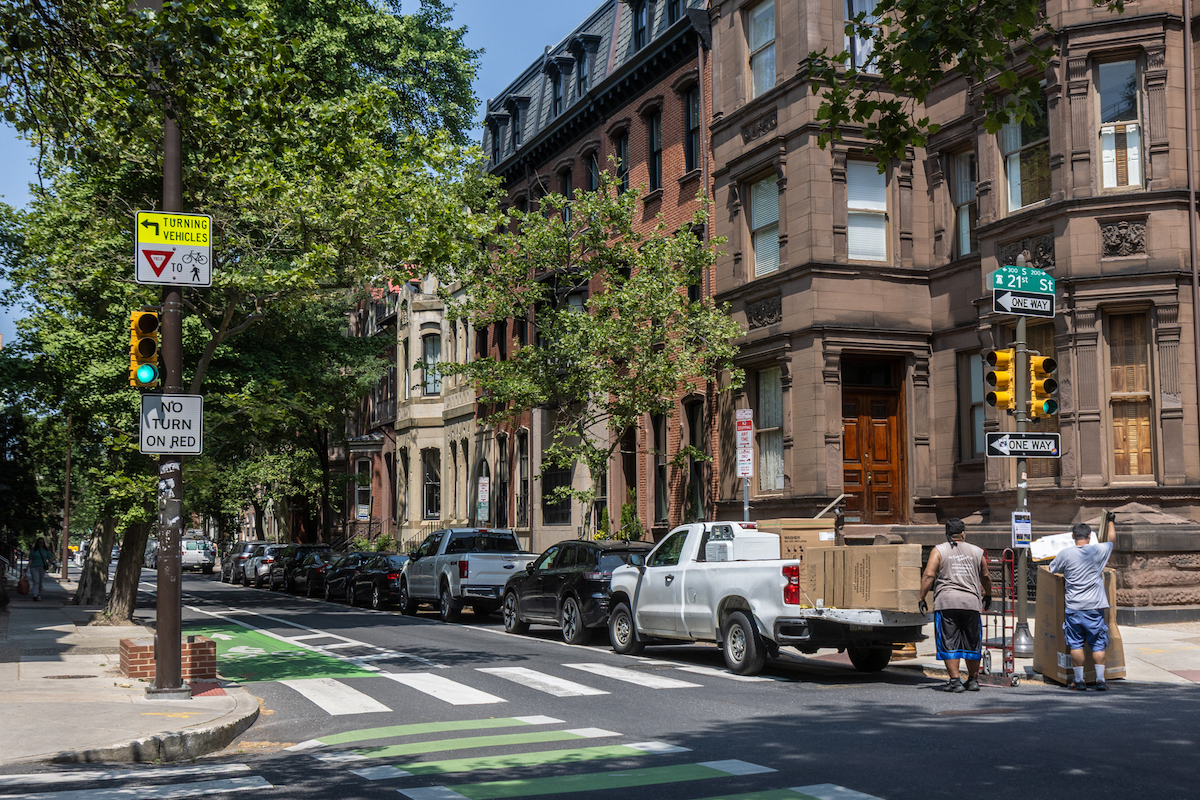 An appliance delivery blocks a curb on Spruce Street in Center City