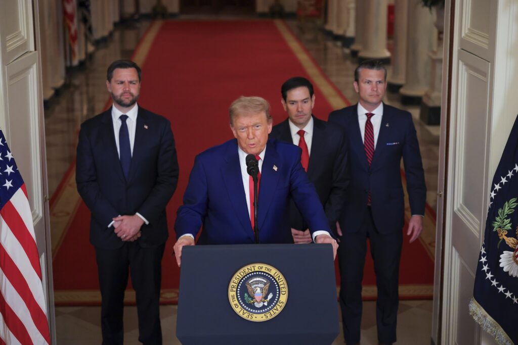 Mideast Wars Trump Trump speaking at a podium