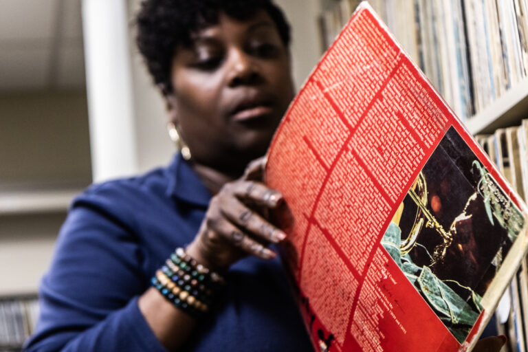 Nicole Sweeney holds an album by Donald Byrd