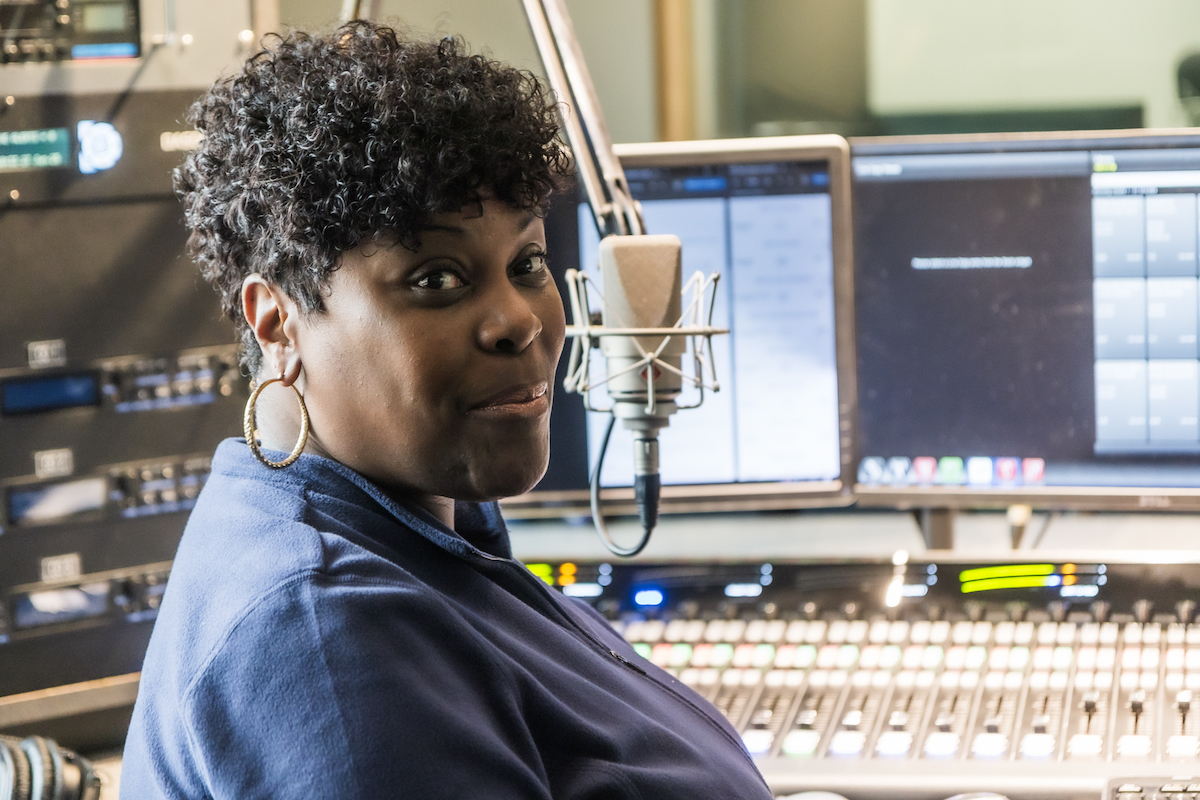 Nicole Sweeney on the mic at the station’s studio