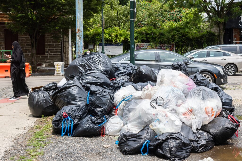 07-02-2025-k-paynter-trash-strike-day-2-Philadelphia-7-new A pile of trash at Queen Lane and Germantown Avenue in Philadelphia