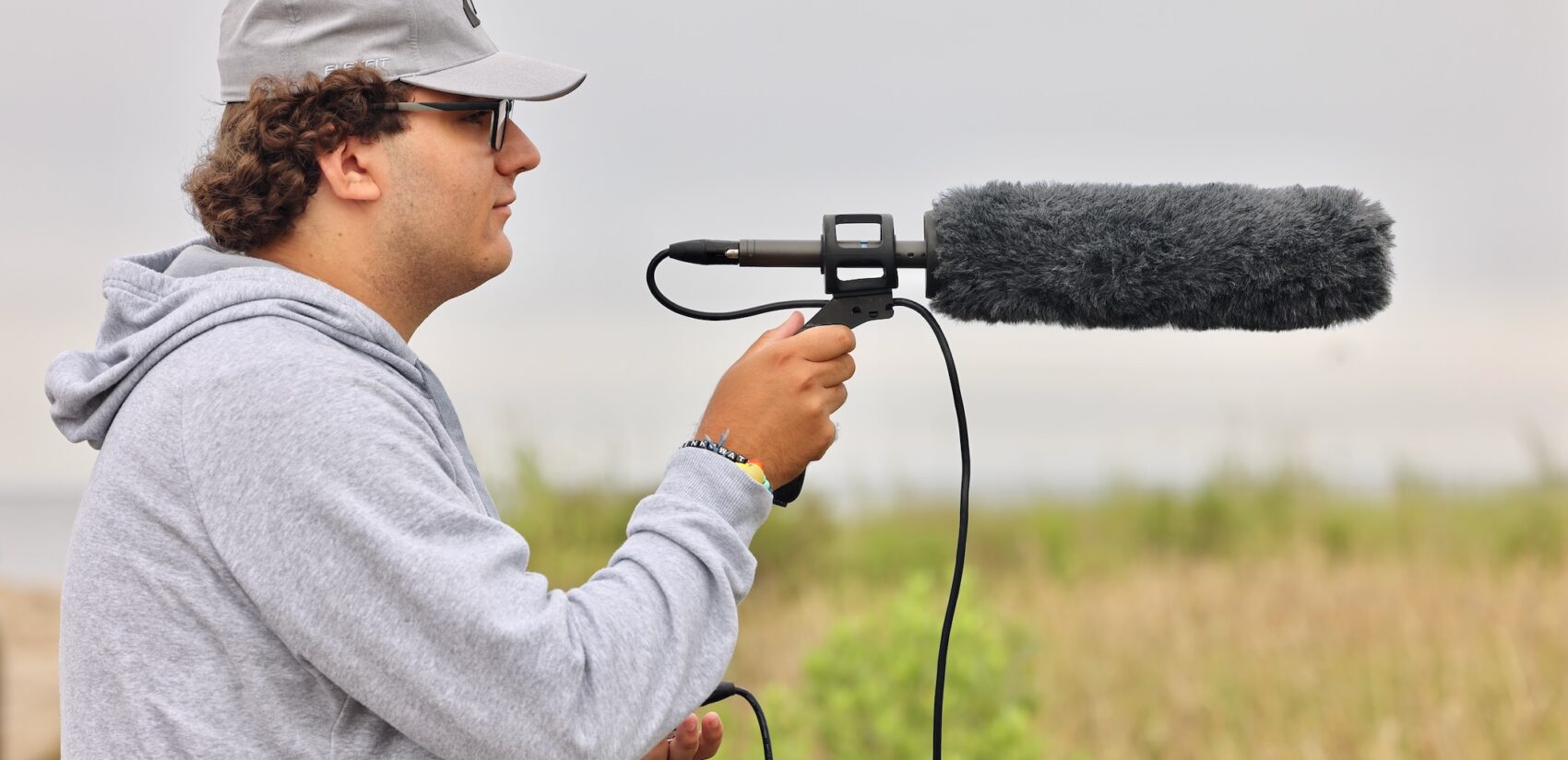 Nicolas Buono recording the songs of seaside sparrows