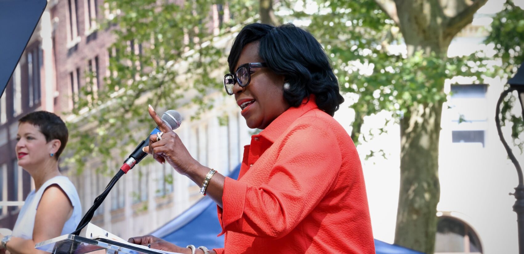 Philadelphia Mayor Cherelle Parker points while speaking from a podium
