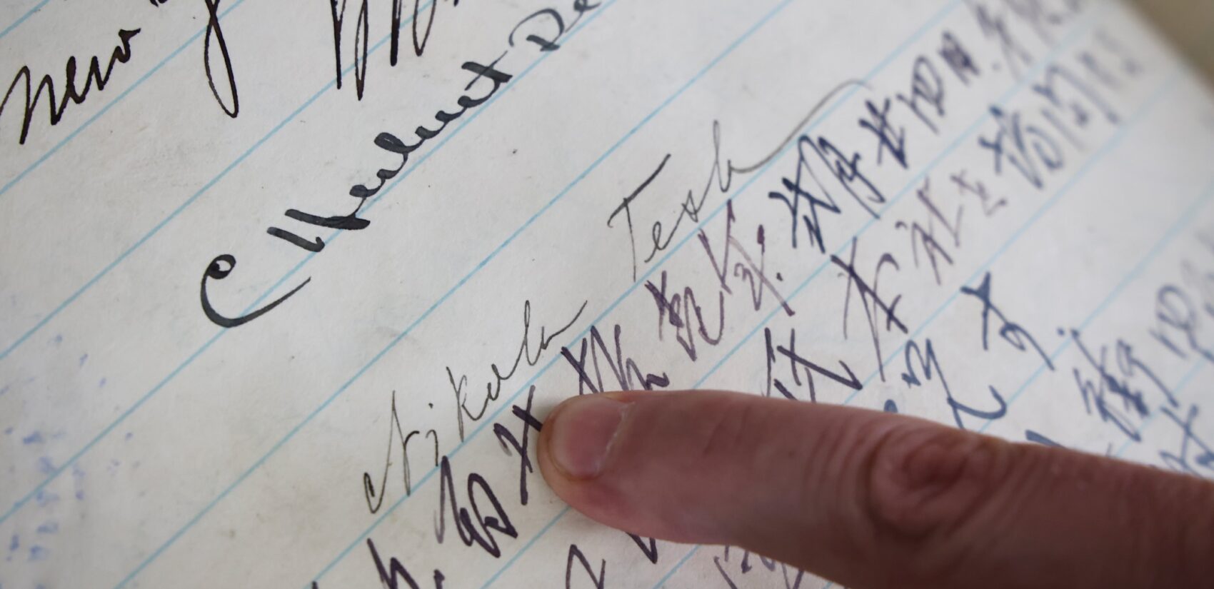 Nathan Raab points out what he believes is the signature of Nikola Tesla