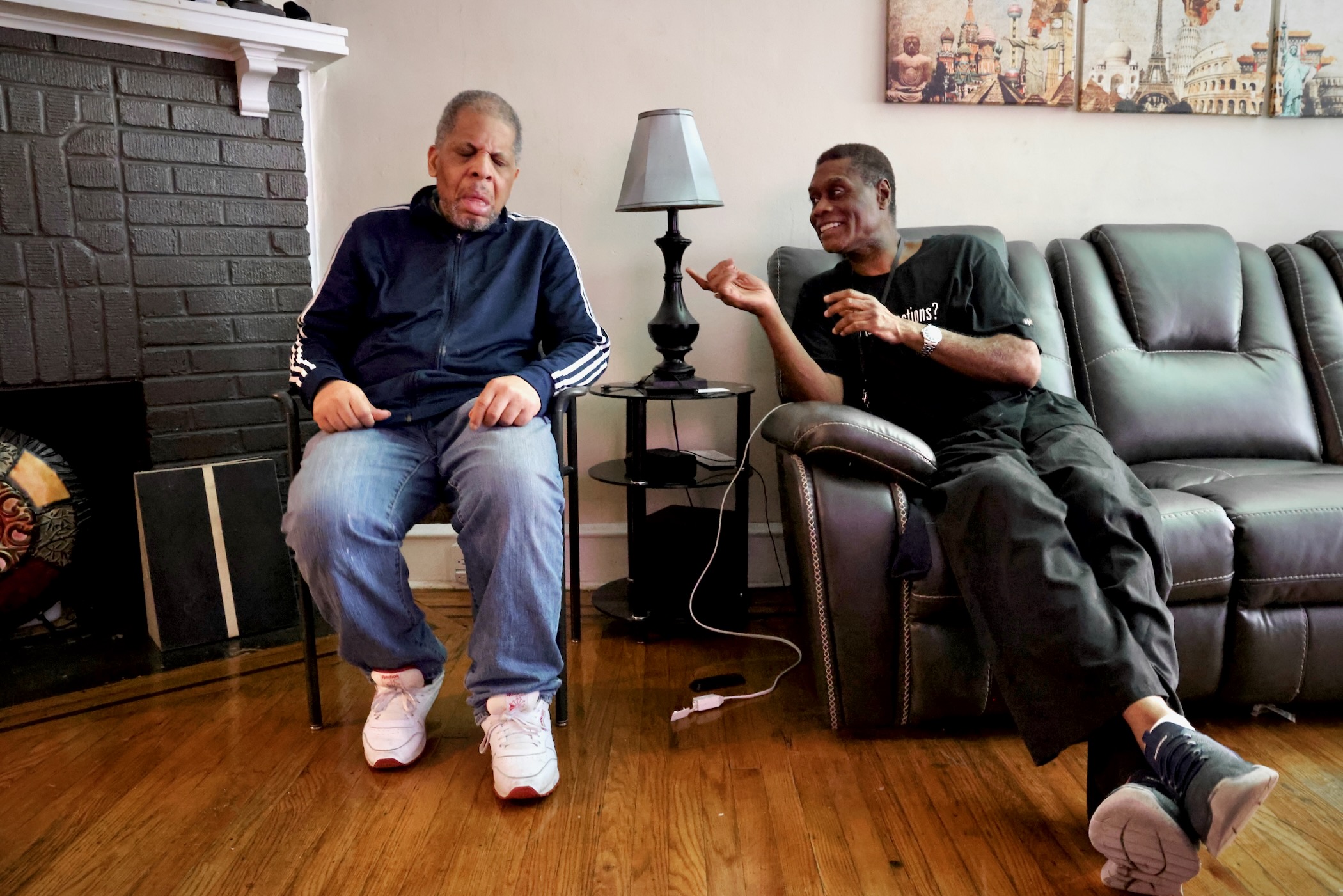 The Senior Companion Program's Joseph Dennis sits with James Henry