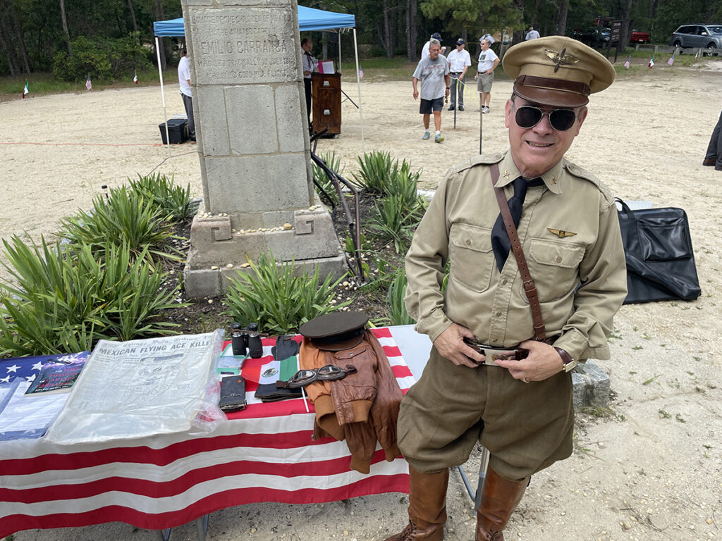 2025 07 12 k burns_Actor Peter Titus has been portraying Mexican fighter pilot Emilio Carranza for several years Actor Peter Titus stands next to items related to Emilio Carranza that he has collected while dressed like an fighter pilot from the era