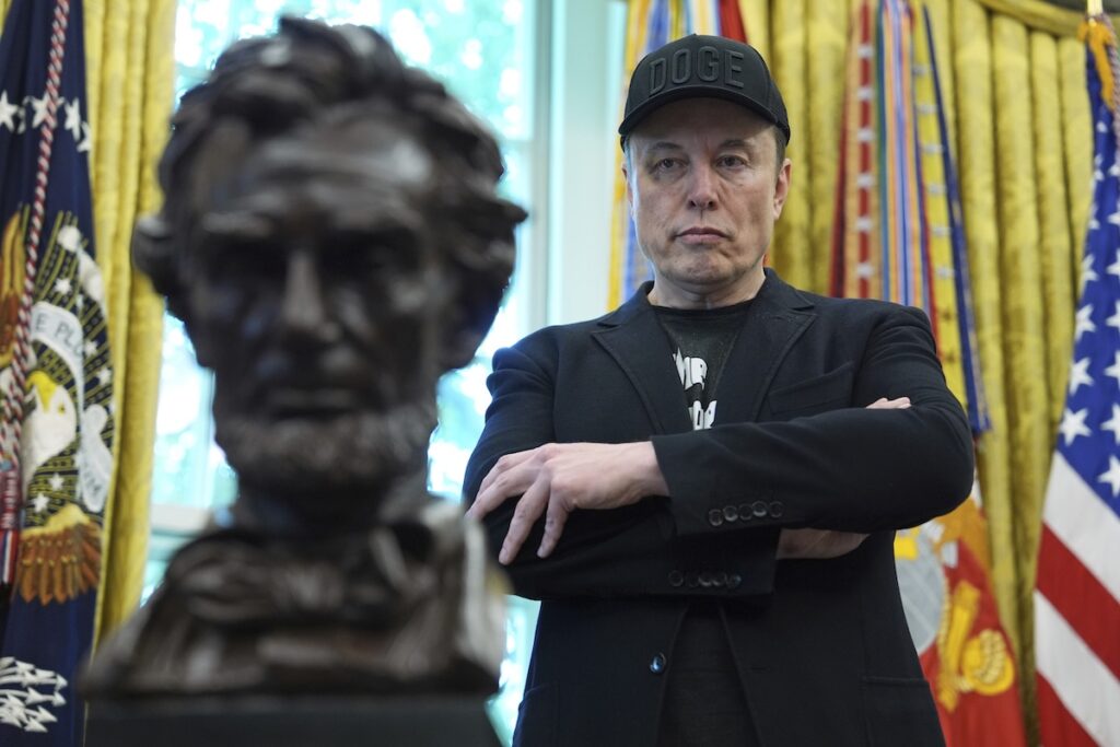Musk Third Parties FILE - Elon Musk listens as President Donald Trump speaks during a news conference in the Oval Office of the White House, May 30, 2025, in Washington. (AP Photo/Evan Vucci, File)