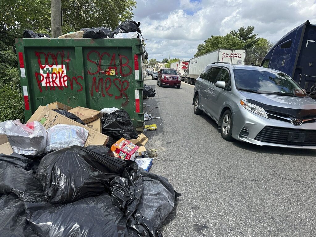Philadelphia Labor Strike Trash piles up around dumpsters in Philadelphia as thousands of city workers remained on strike Monday, July 7, 2025. (AP Photo/Tassanee Vejpongsa)