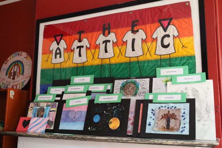 Collection of art made by youth at The Attic Youth Center library