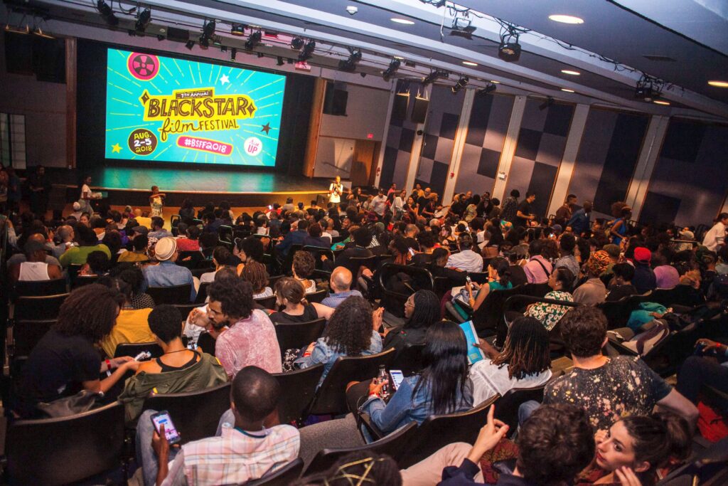 blackstar-film-festival-2018-file Audience members look towards a screen that says