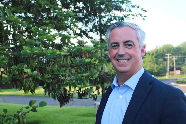 Bucks County Commissioner Bob Harvie poses for a photo outside