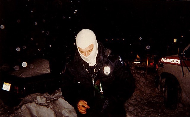 someone heavily bundeled up outdoors in cold weather