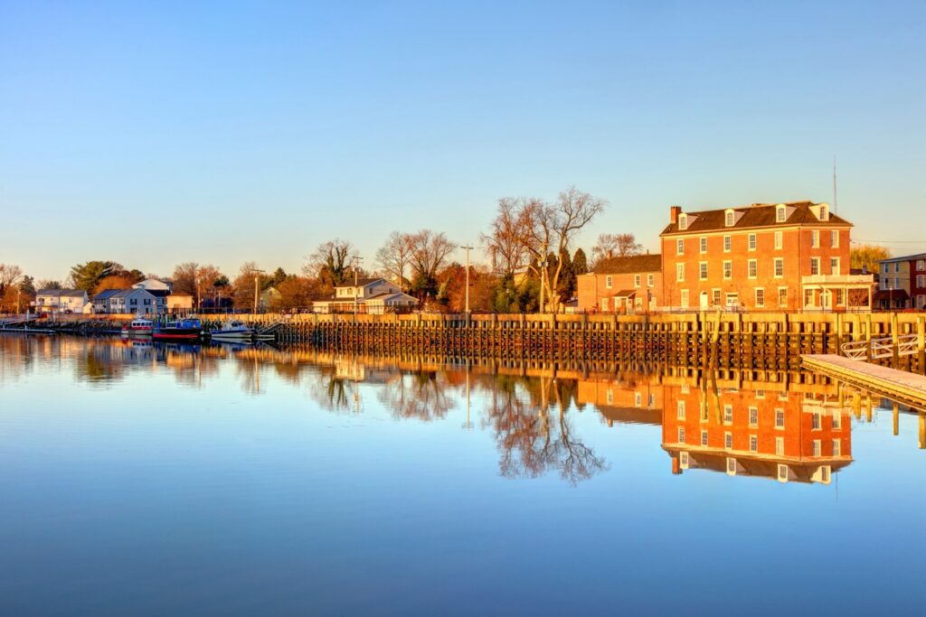a riverfront at sunset