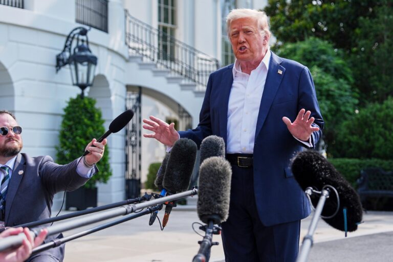 Donald Trump speaks to reporters