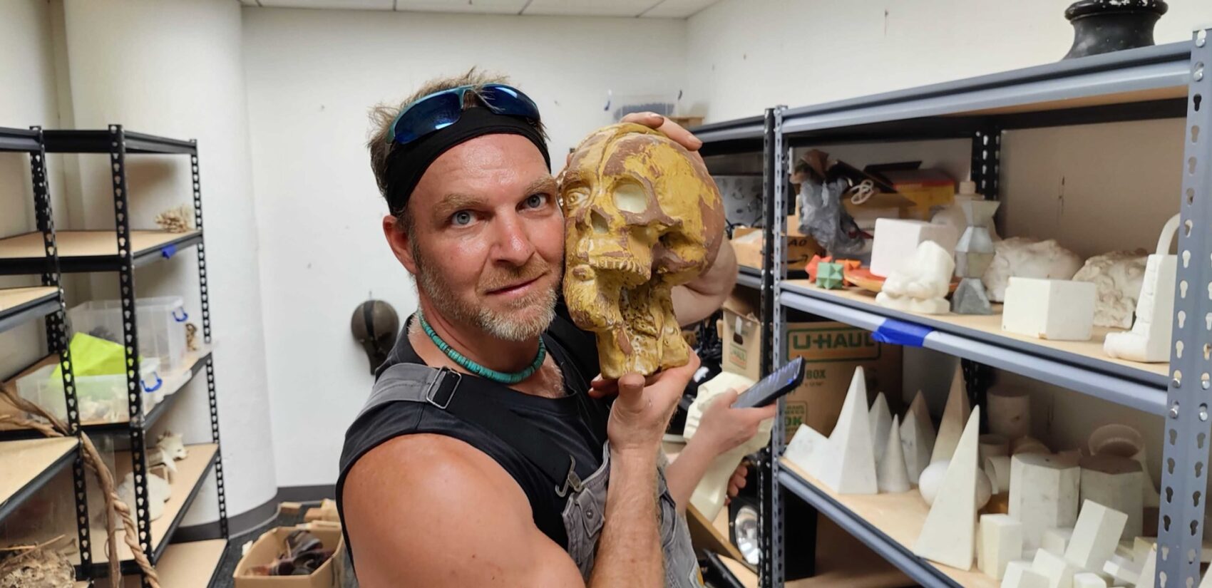 George Mathes of Thunderbird Salvage poses with an anatomical model