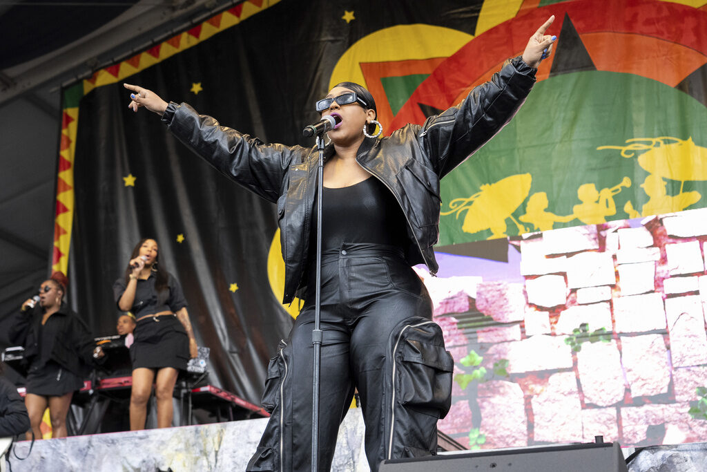 Artist Jazmine Sullivan sings on stage