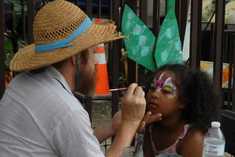 a child receives face paint