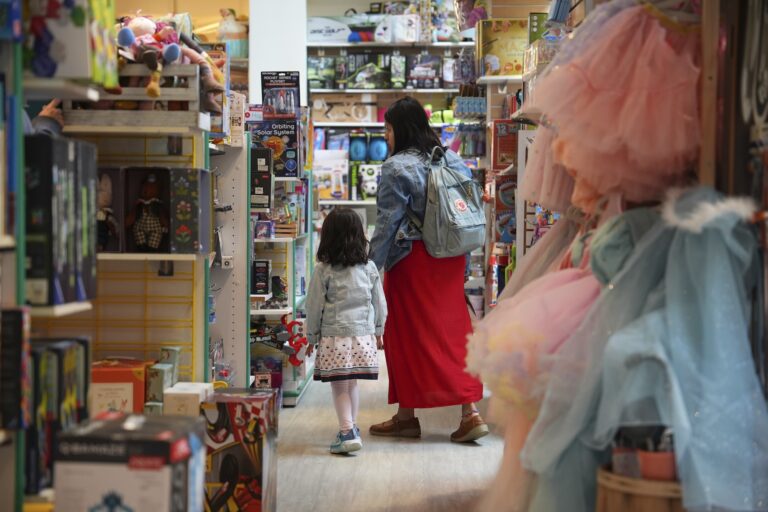 Family shops in a JaZams toy store