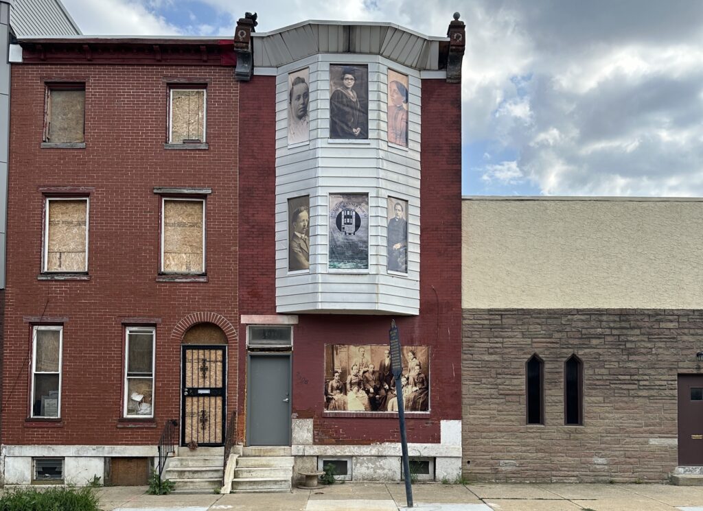 The windows of the Tanner House with pictures on them
