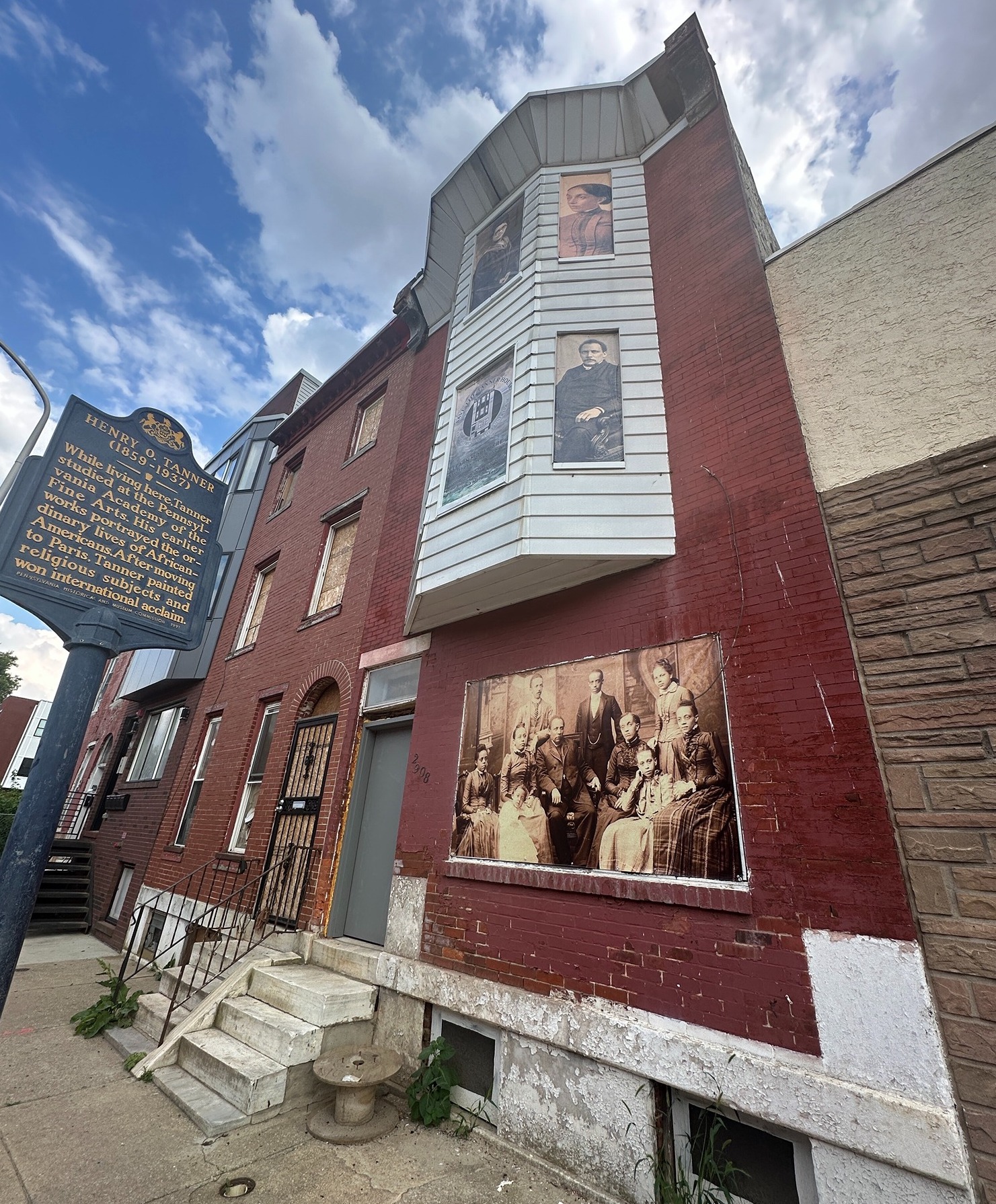 The windows of the Tanner House with pictures on them