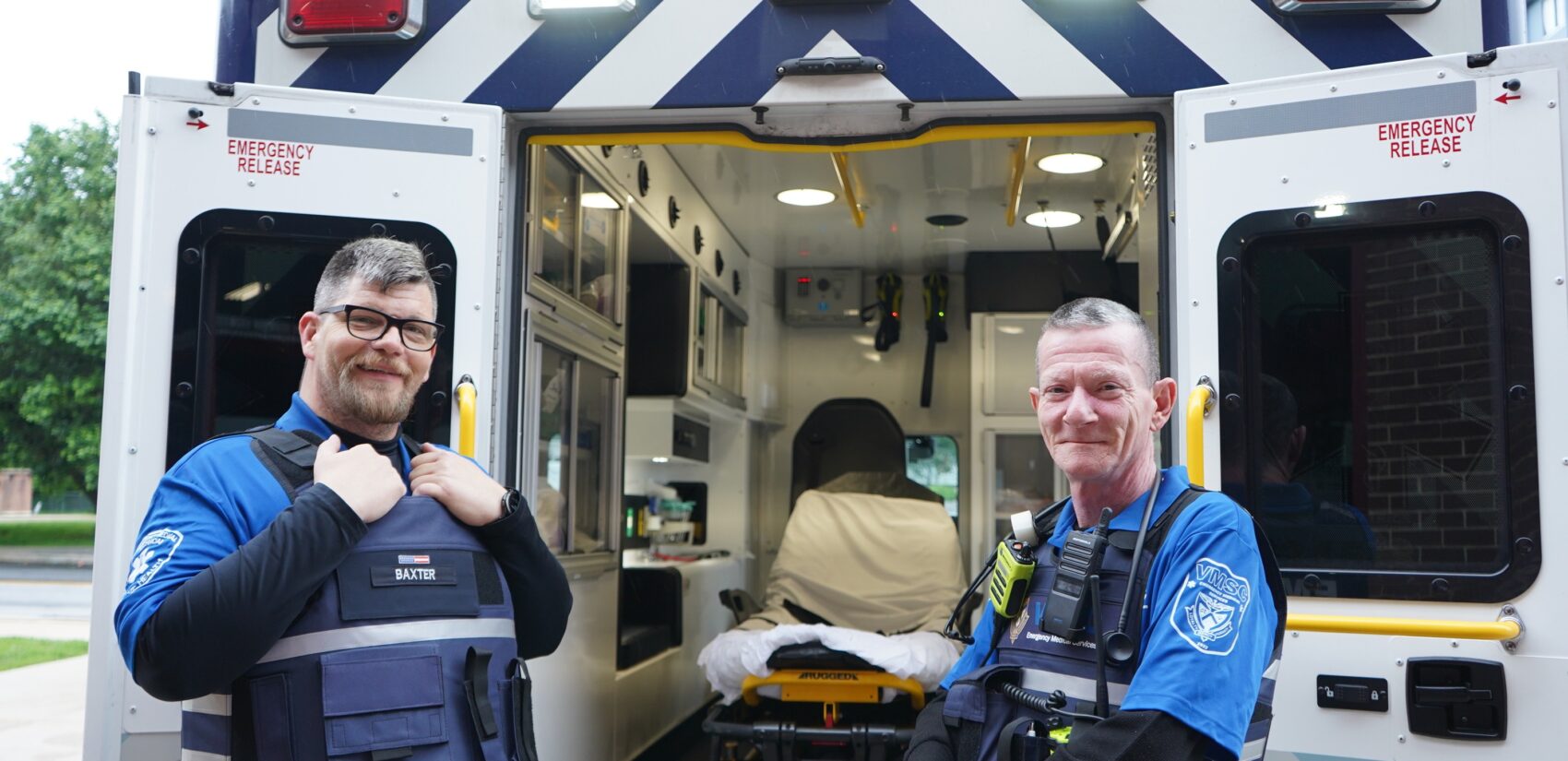 Two VMSC staff smile