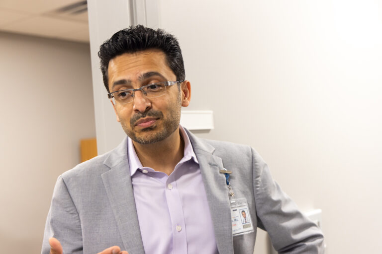 Dr. Mithil Choksey looks on