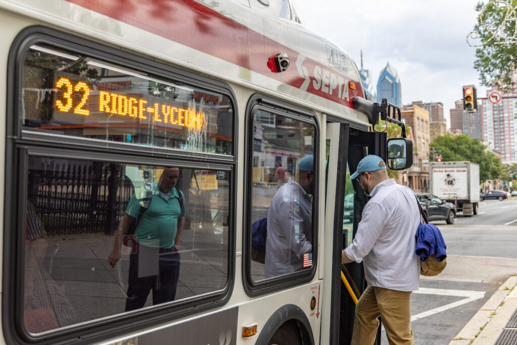 08 25 2025 k paynter SEPTA cuts reax in South Philly Giulio Sorgini boards the 32 bus at Broad and Christian Streets