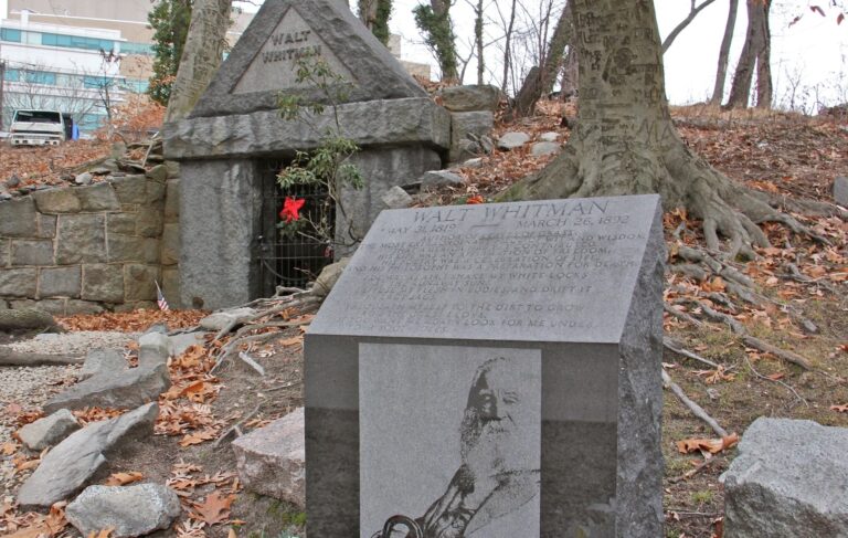 A likeness of Walt Whitman is carved on a memorial marker near his grave site in Camden